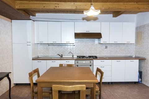 Fridge, oven, dining tables