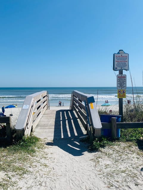 On the beach, sun loungers, beach towels