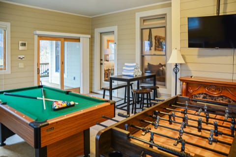 Pool table, foosball, Pac Man and Golden Tee to keep adults and kids entertained