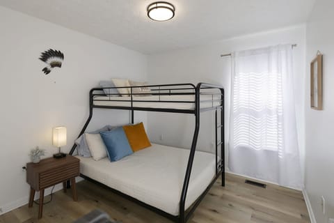 Our second guest bedroom, equipped with a full and twin size bunk bed.