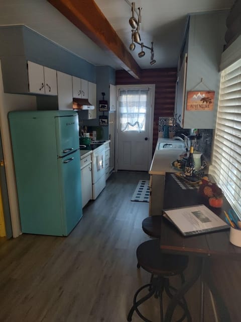 The kitchen is small, but has all of the items you need. 