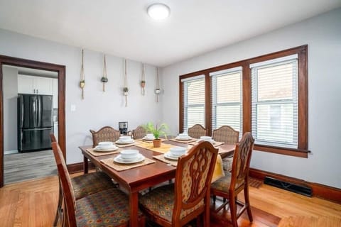 Enjoy meals among friends in the dining room. Tableware for eight is available.