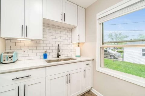 Kitchen with appliances and everything you need for entertaining.