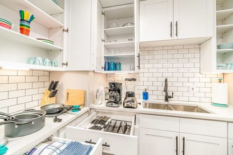 Blender, coffee maker, toaster, cookware, bakeware, mixer, etc.