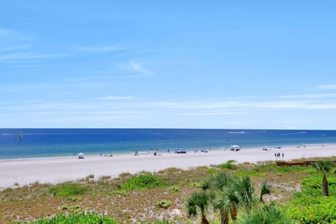 On the beach, sun loungers, beach towels