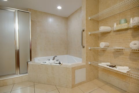 Combined shower/tub, jetted tub, hair dryer, towels