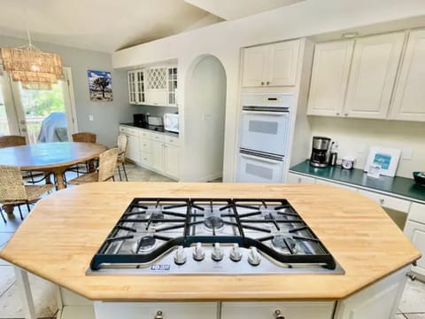 Make your meals on this large island cooktop with 5 burners