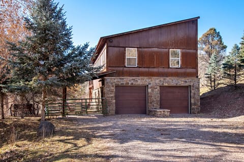 View of home, patio and parking area