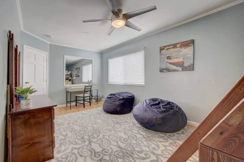 Bedroom 2: Spacious bedroom with plenty of room for lounging and hanging out. Includes a small writing desk with plenty of outlets to keep all your electronics plugged in. 