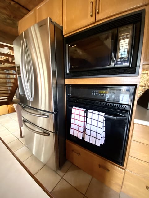 Microwave, dishwasher, coffee/tea maker, cookware/dishes/utensils