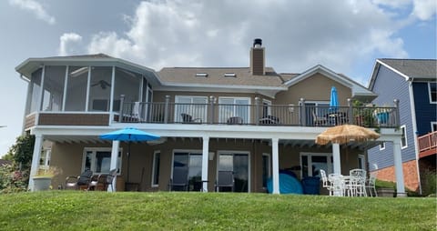 Photo from the waterfront. Porch, Deck, Patio all face the water. 
