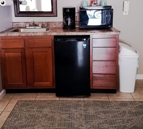 Fridge, microwave, dining tables