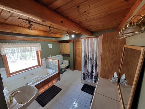 Shower, jetted tub, towels, soap