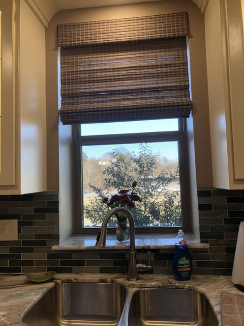 Kitchen sink, brand new appliances, custom made cabinets,