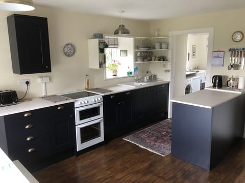 Kitchen looking through to the scullery.