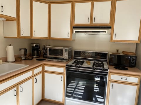 Full stove with oven, Air Fryer Toaster Oven, microwave oven, coffee maker