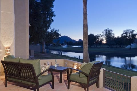 Expansive private patio overlooking the golf course and waterway. It is half covered for shade lovers and half open for sun worshippers.
