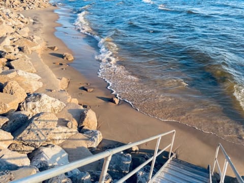 Beach nearby, sun loungers