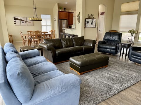 Living & dining room, message board and kitchen view.  Spacious 2100 Sq Ft home.