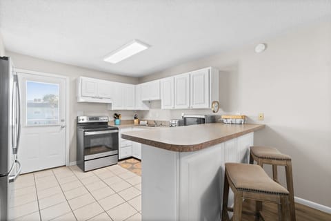 Cook with ease in our fully equipped kitchen, stocked with everything you need! 🍳✨