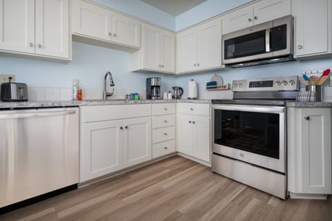 The place well equipped, comfortable couch, cozy kitchen. -Ingrid