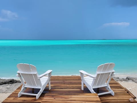 On the beach, sun loungers, beach towels