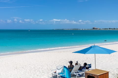 On the beach, sun loungers, beach towels