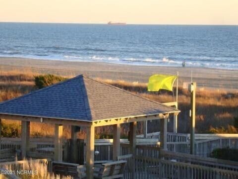 On the beach, sun loungers, beach towels