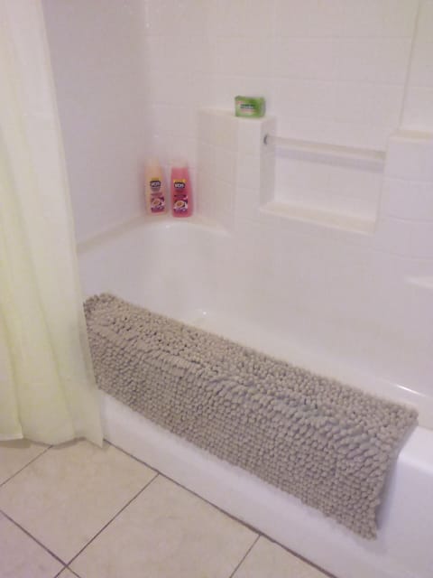 Combined shower/tub, hair dryer, towels, soap