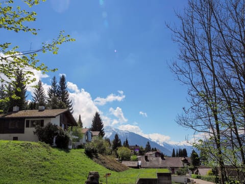 Cloud, Sky, Plant, Mountain, Building, Natural Landscape, Leaf, Natural Environment, Tree, Grass
