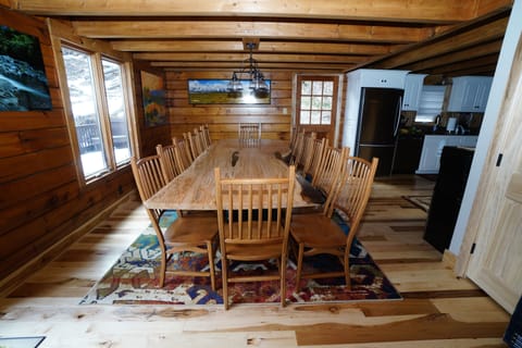 Dining Room with seating for 14 at custom-made dining table