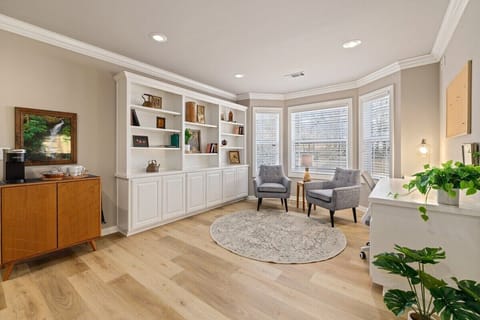 Upstairs is our study room, complete with a coffee bar, a seating area, and a desk - great for guests traveling for work or looking to get a few projects done on vacation!