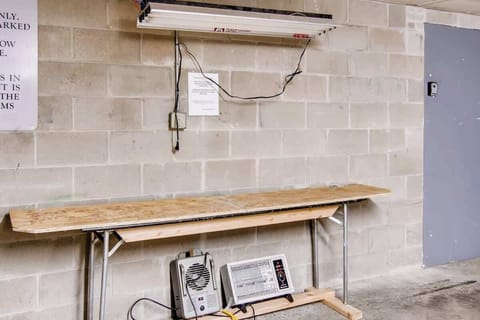 Public use ski wax station setup in the garage