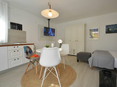 Furniture, Cabinetry, Table, Chair, Building, Drawer, Lighting, Interior Design, Comfort, Wood