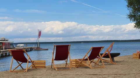 Beach nearby, sun loungers