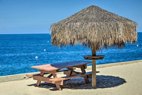 On the beach, sun loungers, beach towels