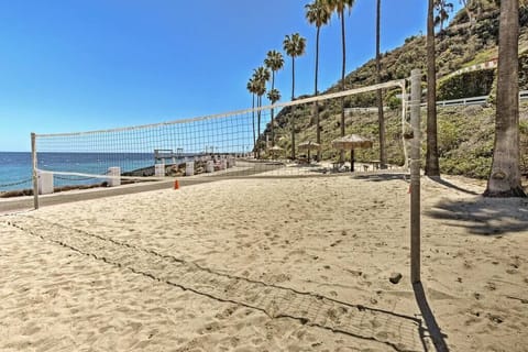 On the beach, sun loungers, beach towels