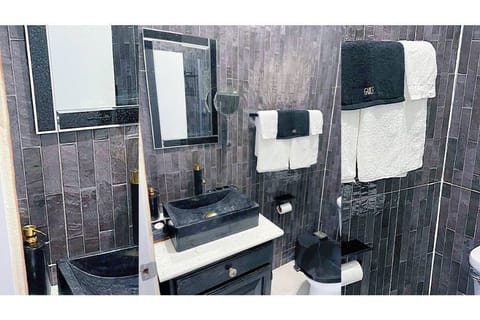 Combined shower/tub, hair dryer, towels, soap