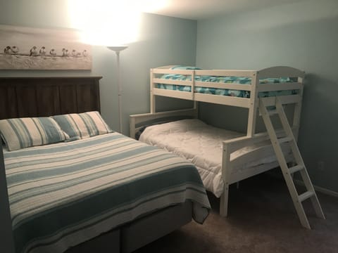 Bedroom #1 with queen bed, twin over full bunk bed and full bathroom!