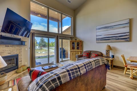 This expansive living space includes WIFI, TV, and a new sofa for kicking back and watching your favorite show or movie.