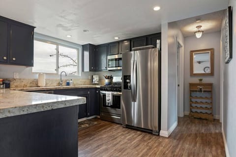 Remodeled open concept kitchen with stainless appliances and fully stocked with everything you need to cook up an amazing meal for family and friends.