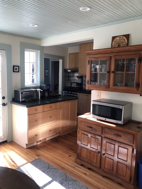 Kitchen with toaster oven and Microwave