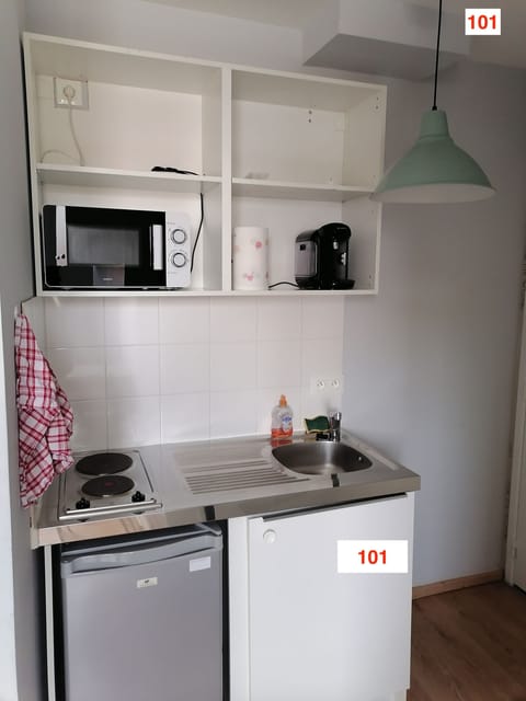 Fridge, microwave, coffee/tea maker, dining tables