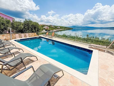 Blue, Water, Swimming Pool, Resort, Composite Material, Eco Hotel, Outdoor Furniture, Hotel, Resort Town, Villa