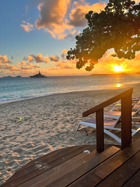 On the beach, sun loungers, beach towels