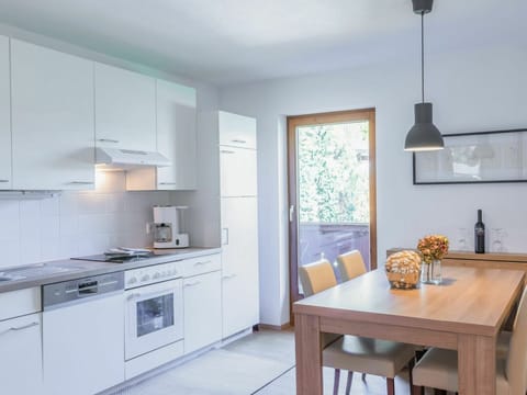 Furniture, Cabinetry, Property, Table, Countertop, Interior Design, Wood, Floor, Chair