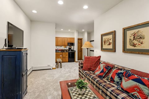 Enjoy a movie in this comfortable den area