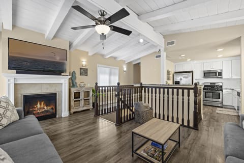 Huge TV, fireplace and comfortable living room.