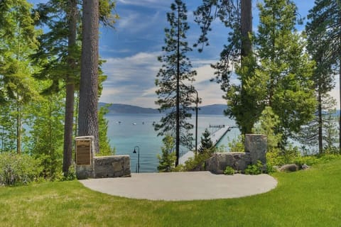 Main Meadow with staircase to lakefront pool, beach and pier