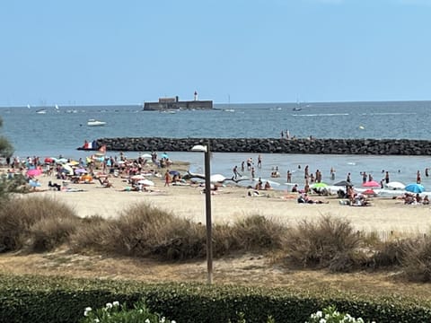 On the beach, sun loungers